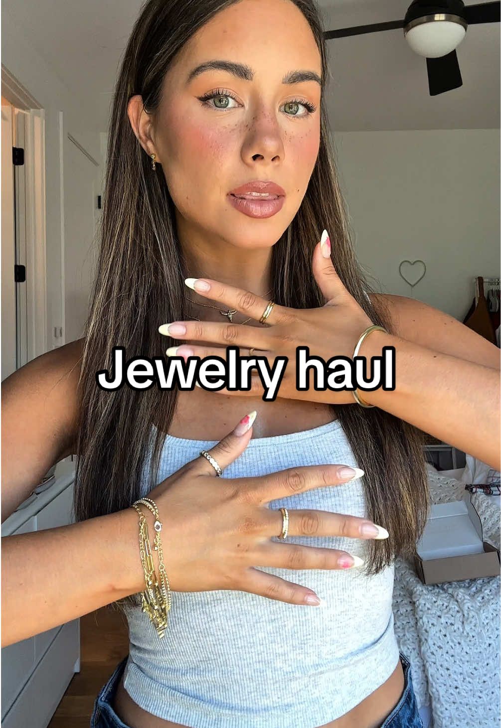 TikTok post by @inatalieking for Uncommon James. Caption reads: the jewelry is the outfit! Shop @Uncommon James....