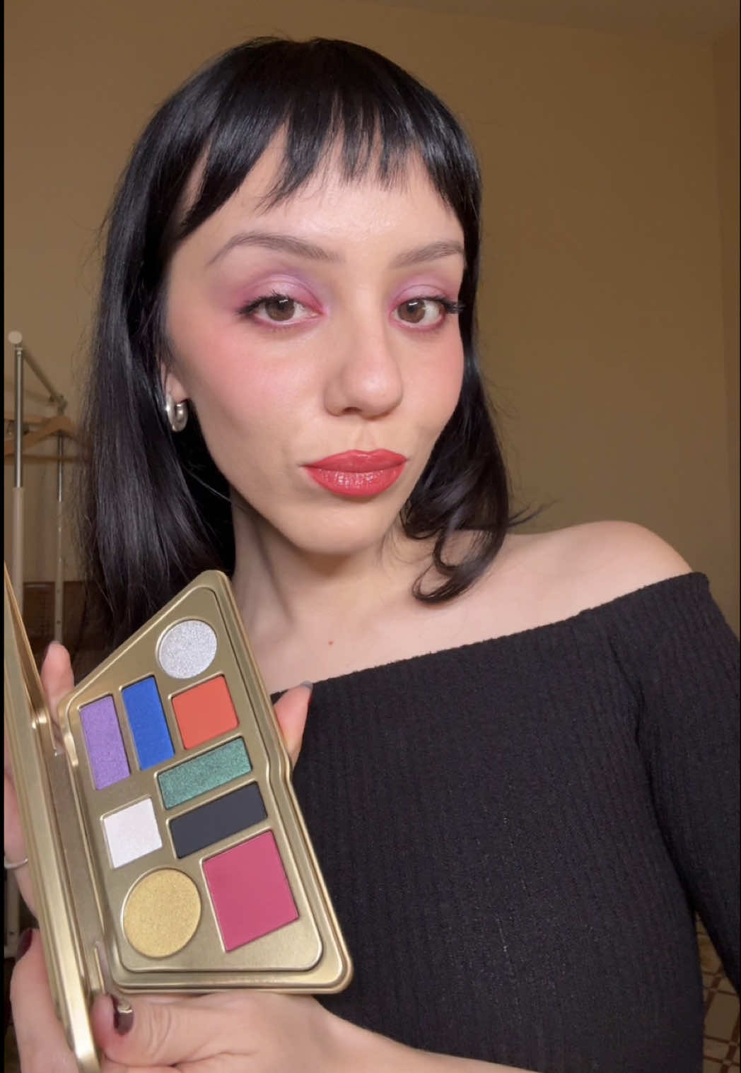 TikTok post by @caloash for Aora Makeup. Caption reads: @AORA MAKEUP @Aora Makeup US is a colorful lovers....