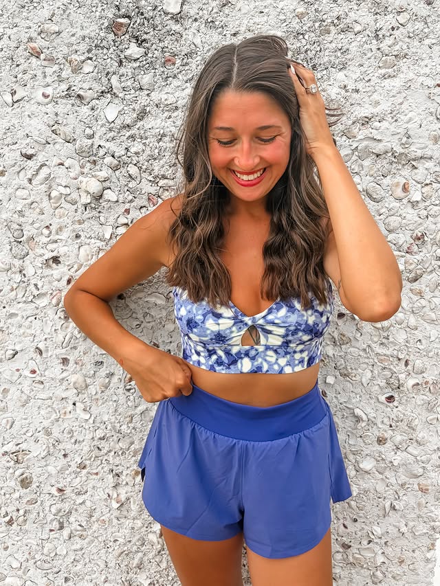 Instagram post by @surratt_holly for Fabletics. Caption reads: [...] month? Let me know in the comments ⬇️....