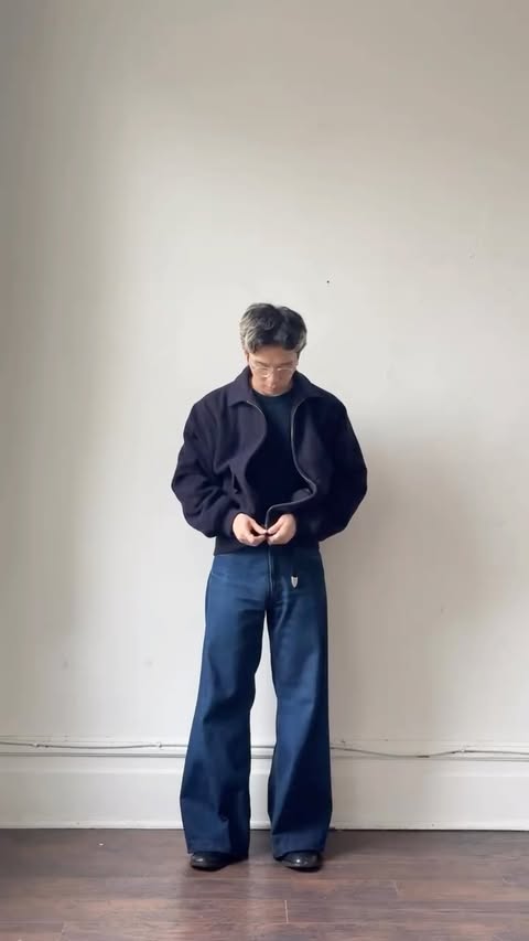 Instagram post by @lukeliiu for Prada Beauty. Caption reads: navy monochrome outfit. i usually default to black....