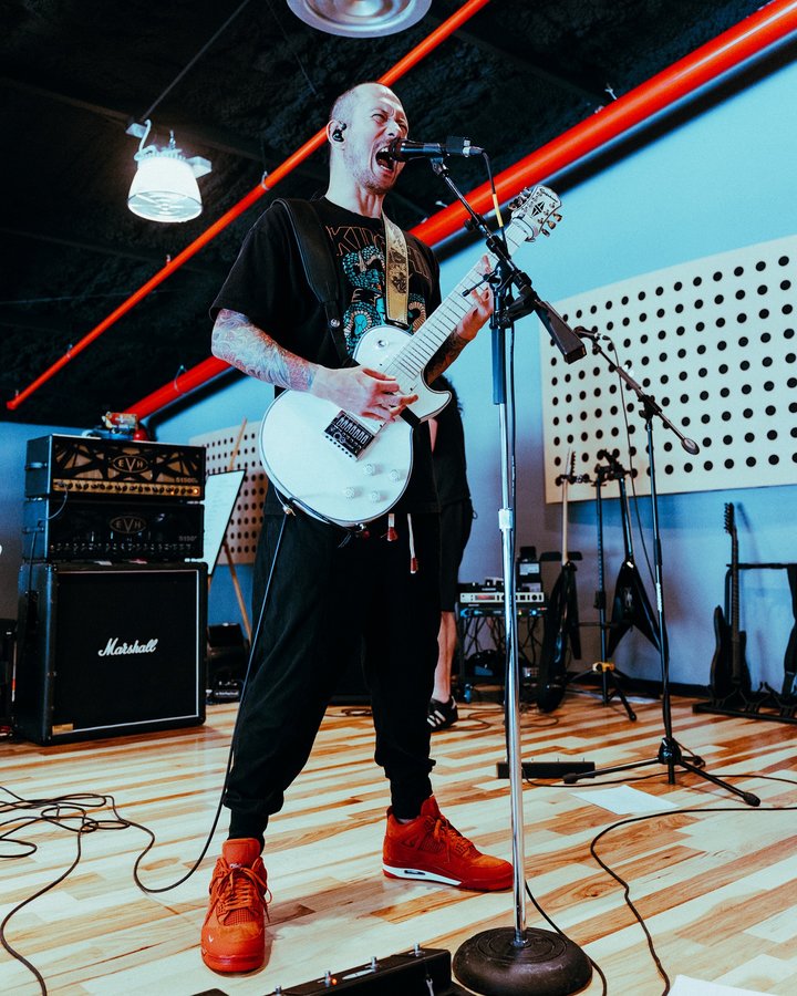 Instagram post by @matthewkheafy for 1 Shot Energy. Caption reads: What’s your favorite trivium song to sing in the....