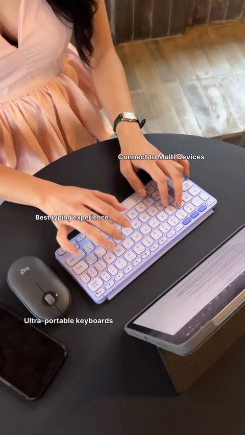 Instagram post by @m.ileey for Logitech. Caption reads: [...] 💜⌨️
Work, type, and go anywhere with....