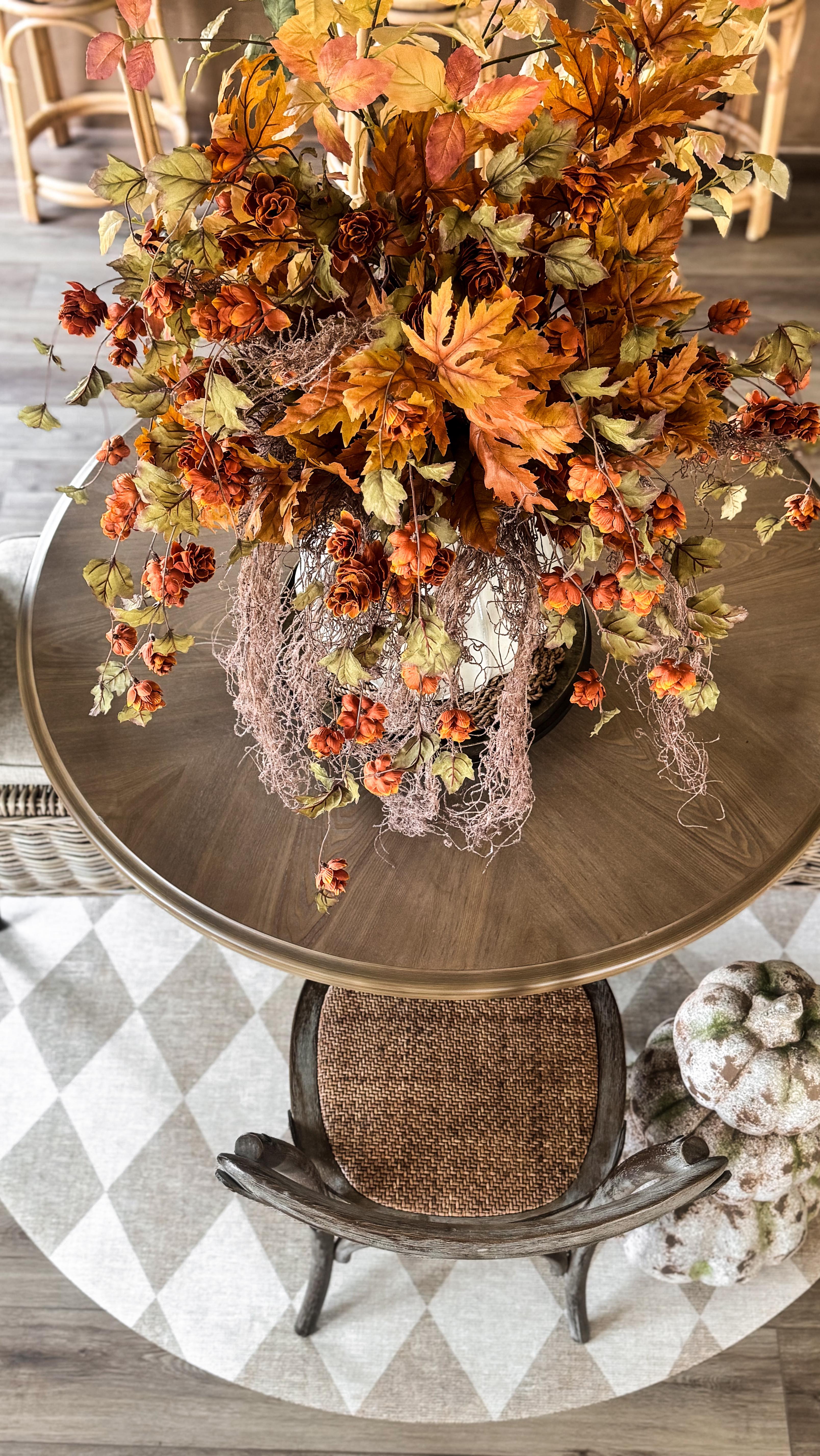 Instagram post by @krystlemarienickels for Cottages & Bungalows Magazine. Caption reads: Sometimes decorating for a new season feels....