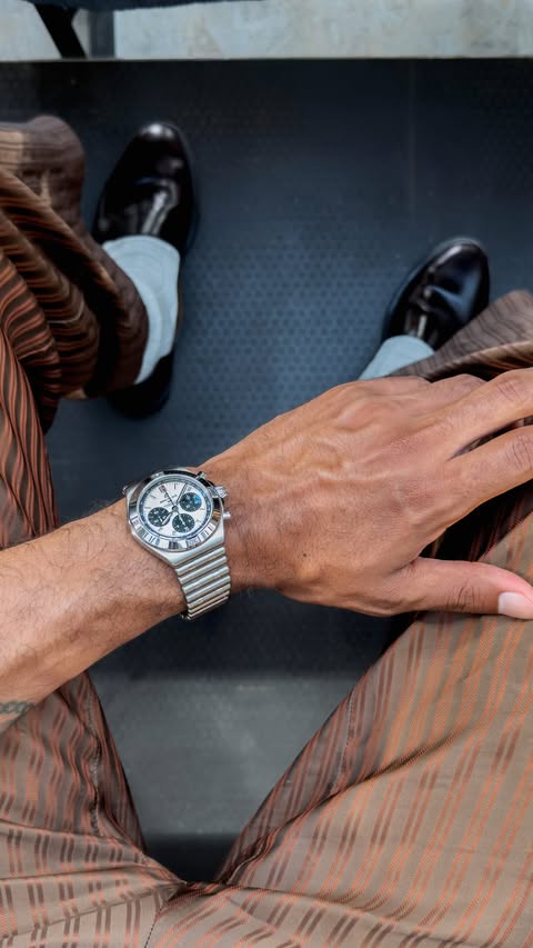 Instagram post by @newkissontheblog for Breitling. Caption reads: [...] of time. Wearing the newly upgraded....