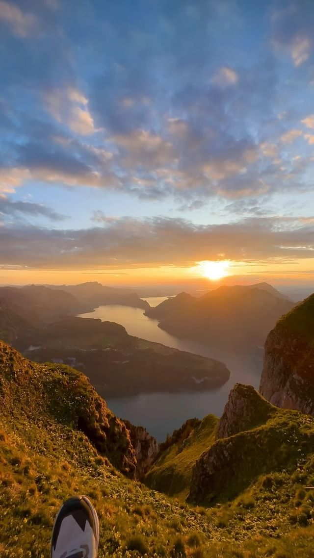 Instagram post by @swissaround for NORQAIN. Caption reads: 🌄 Sunset Adventures with @norqain 🇨🇭
📍Dreamy....