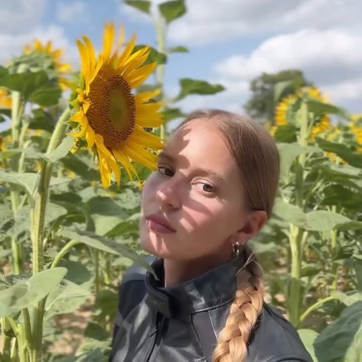 Instagram post by @dominika_rides for Alpinestars. Caption reads: [...] sunflowers were curious about it..
🌻....