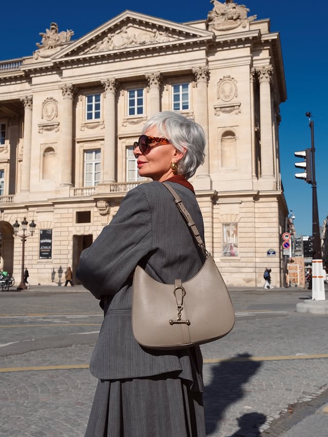 Instagram post by @greceghanem for Strathberry. Caption reads: [...] meetings and errands in Paris, my....