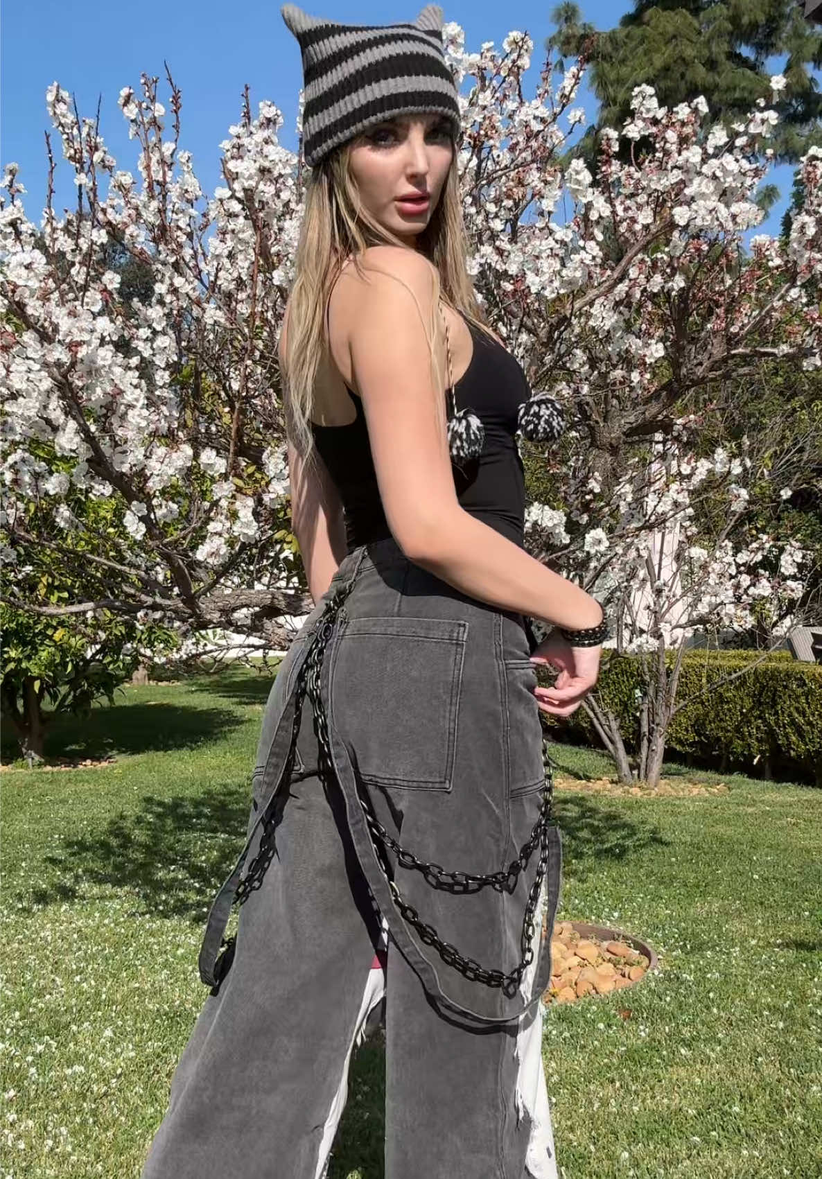 TikTok post by @amberxeclipse for Dolls Kill. Caption reads: My new favorite Jeans 😭🫶 #dollskill #outfit....
