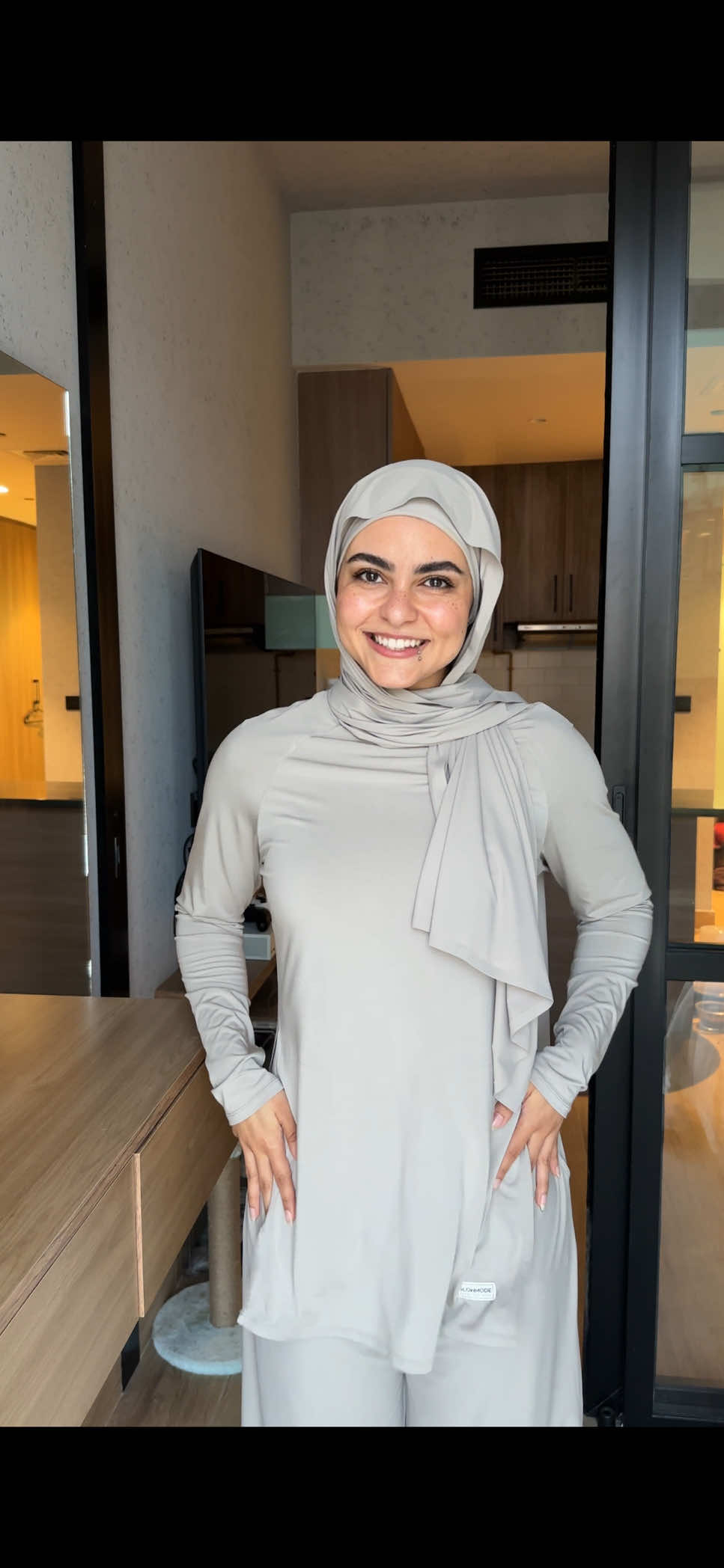 TikTok post by @reem_eltaweel for Glowmode. Caption reads: So excited to share Glowmode x Reem modest....