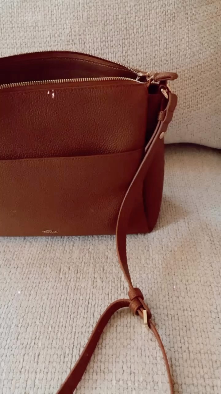 Instagram post by @britneelunsford for Tocco Toscano. Caption reads: Obsessed with my new marlows bag from....