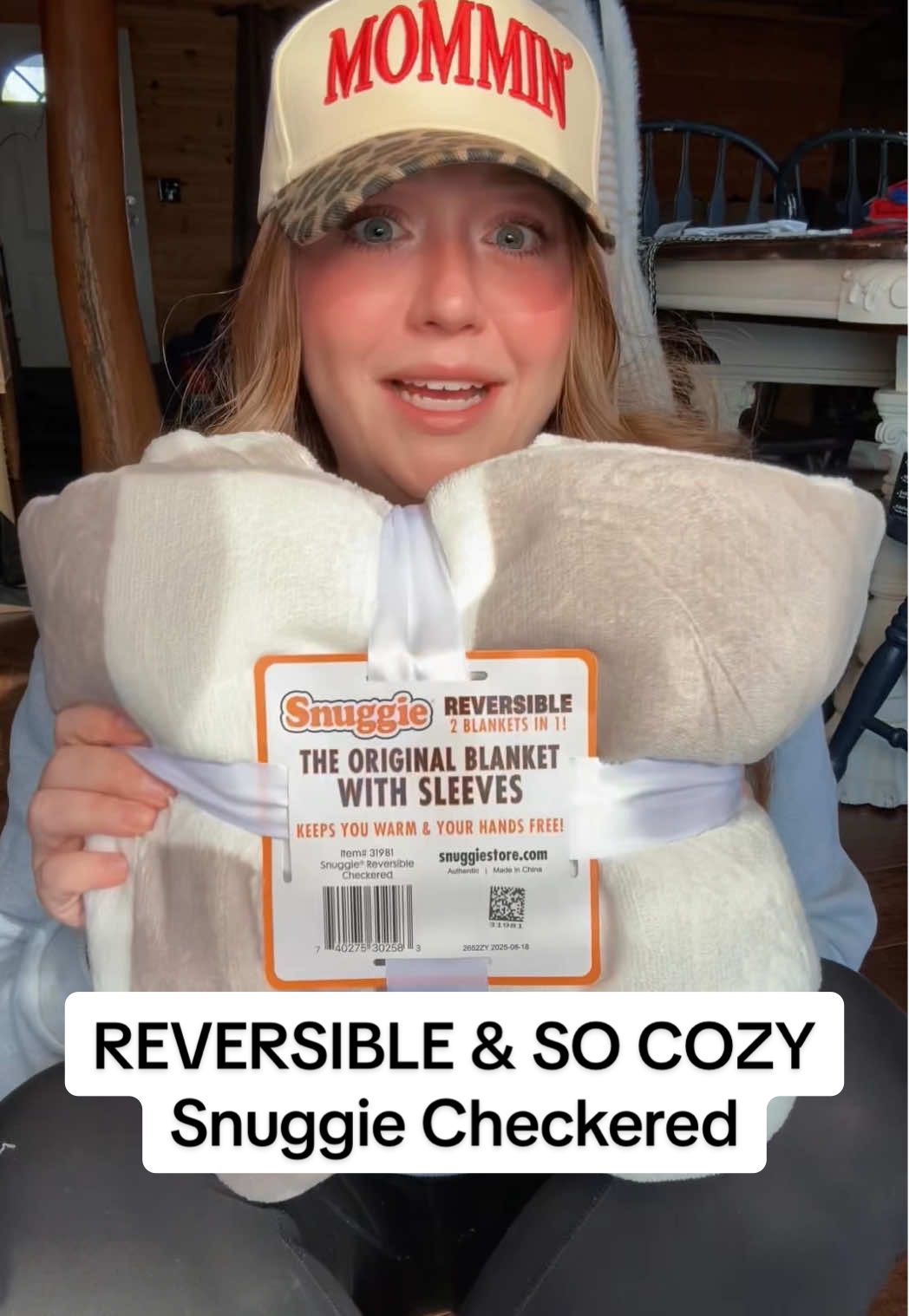TikTok post by @jessicakayc for Snuggie. Caption reads: This reversible @Snuggie is doing everything 👀....