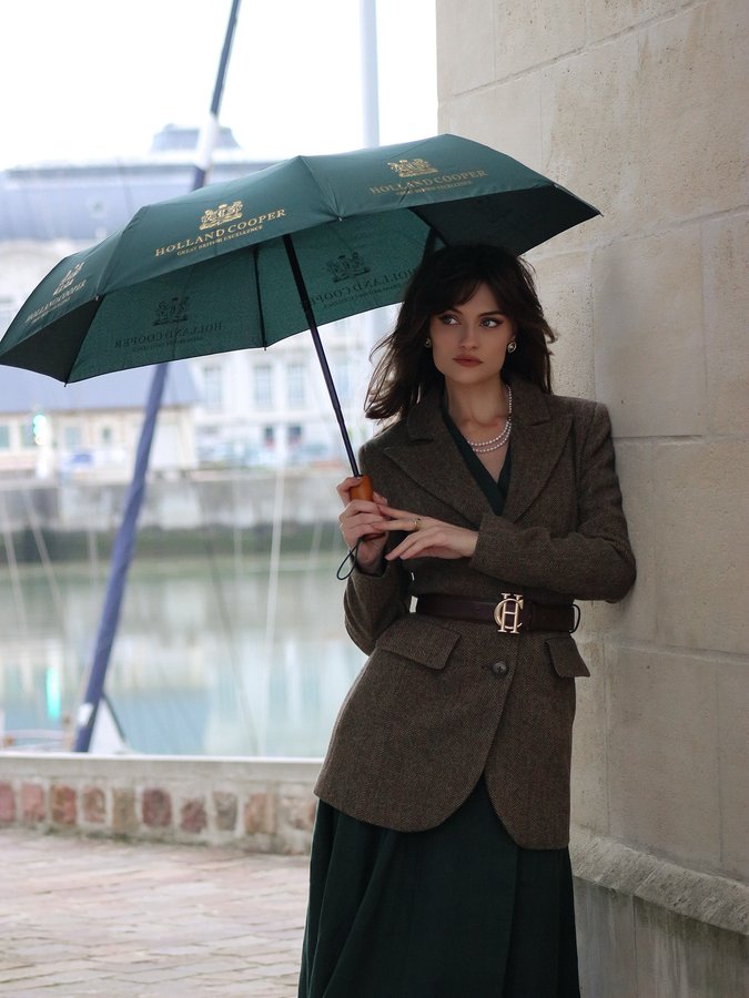 Instagram post by @minakshi.mahta for Nice Cream London. Caption reads: A casual chic outfit for a rainy day 🌧️ 

Blazer....