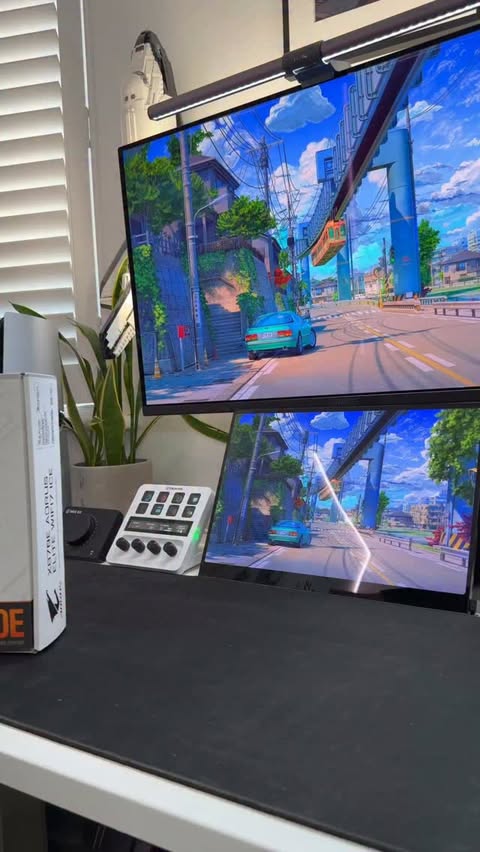 Instagram post by @developeradam for AORUS. Caption reads: [...] the Motherboard we’re using is the X870E....