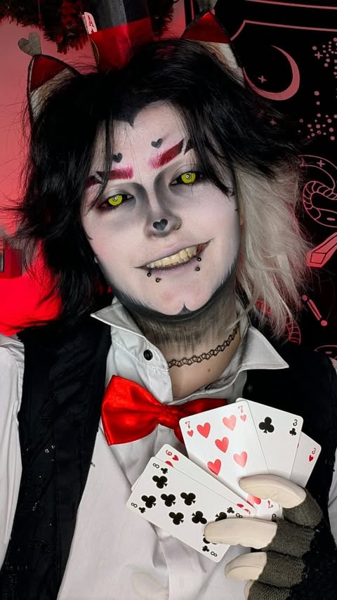 Instagram post by @easygoinggoth for MocoQueen. Caption reads: HUSK COSPLAY IS BACK ♣️♦️♠️♥️
°
°Contacts:....