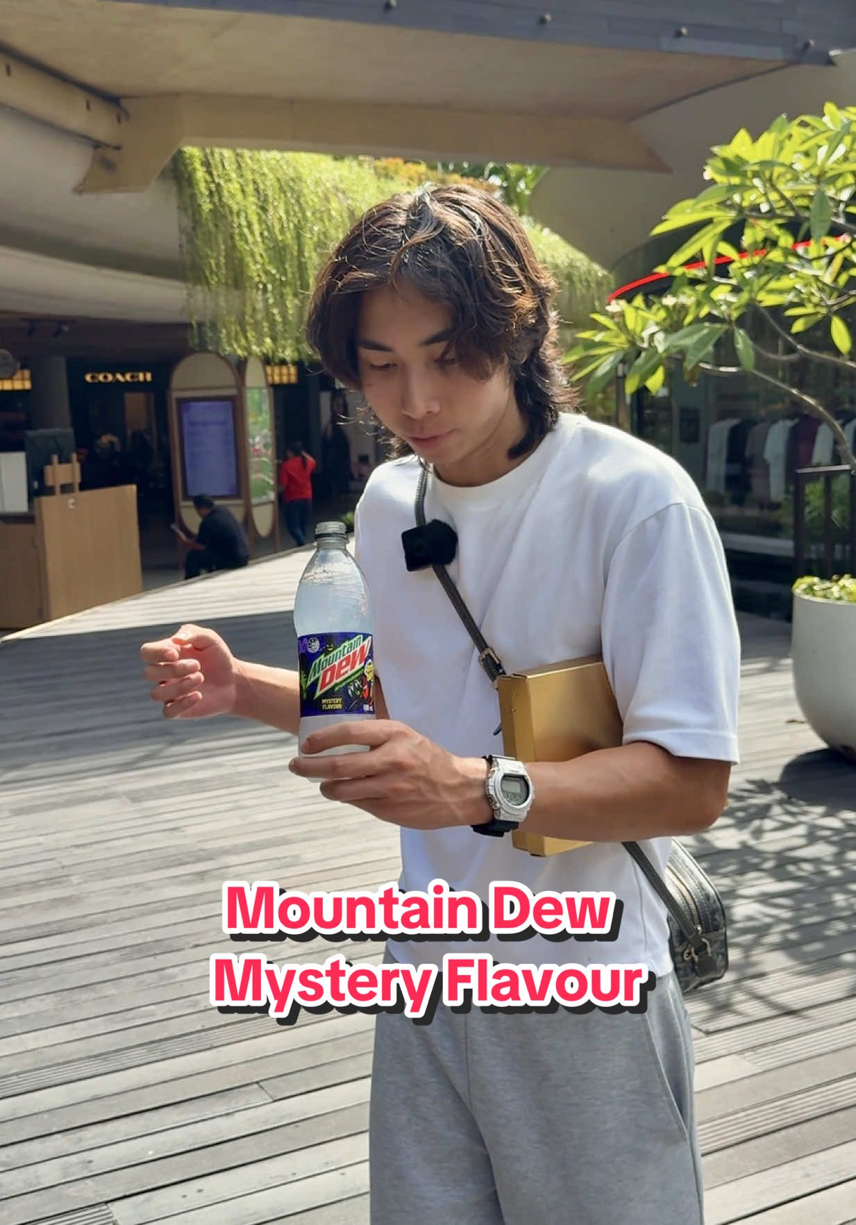 TikTok post by @andythesk for Mountain Dew. Caption reads: Could you guess this flavour? 🤷‍♂️👀 #ad #VooDew....