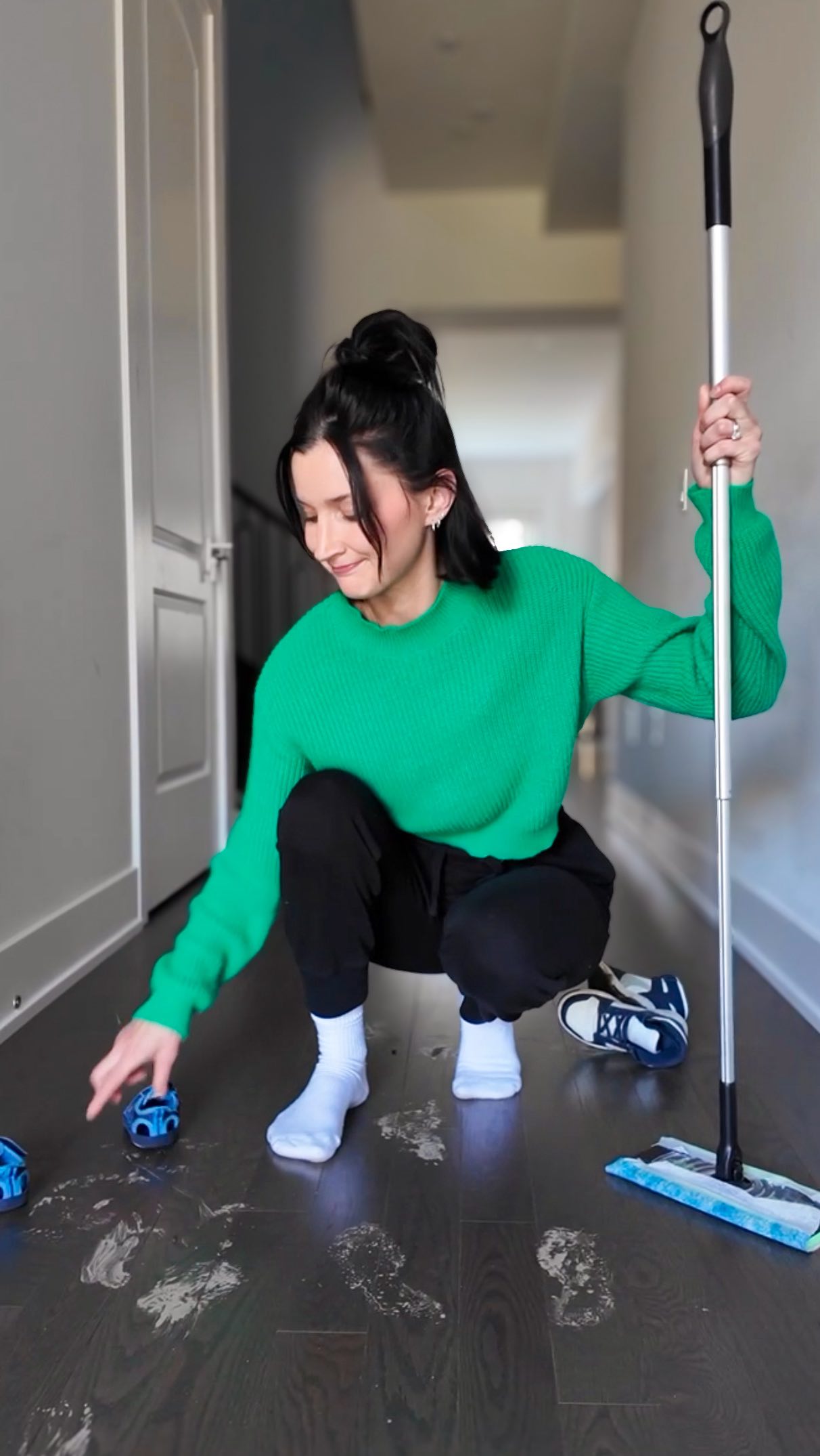 Instagram post by @kaelahe_ for Swiffer. Caption reads: #Ad #SwifferPartner Life with two little boys =....