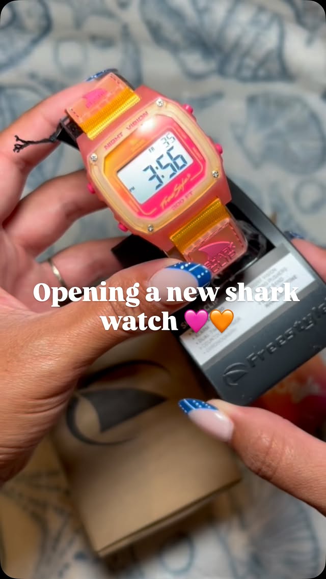 Instagram post by @nikkitheasian for Freestyle Watches. Caption reads: Sunset strapped to my wrist 🧡🩷 @freestylewatches....