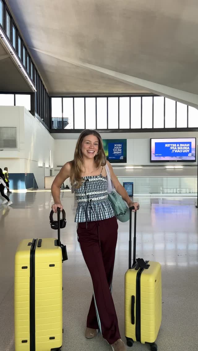 Instagram post by @anna_barger for Away. Caption reads: Kept up with my backpack in Paris @away....