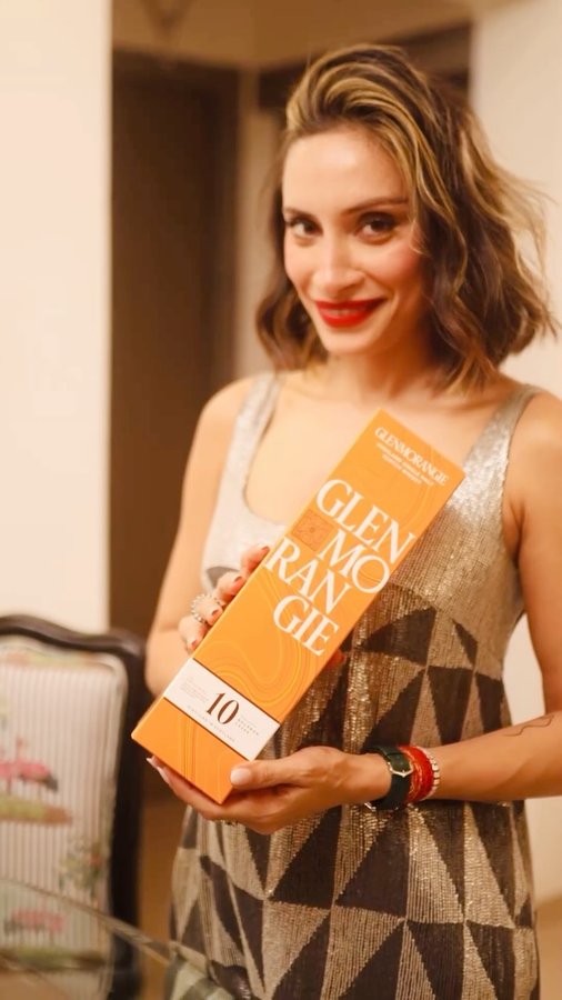 Instagram post by @amrita_thakur for GLENMORANGIE. Caption reads: Glenmorangie and at home celebrations are always....