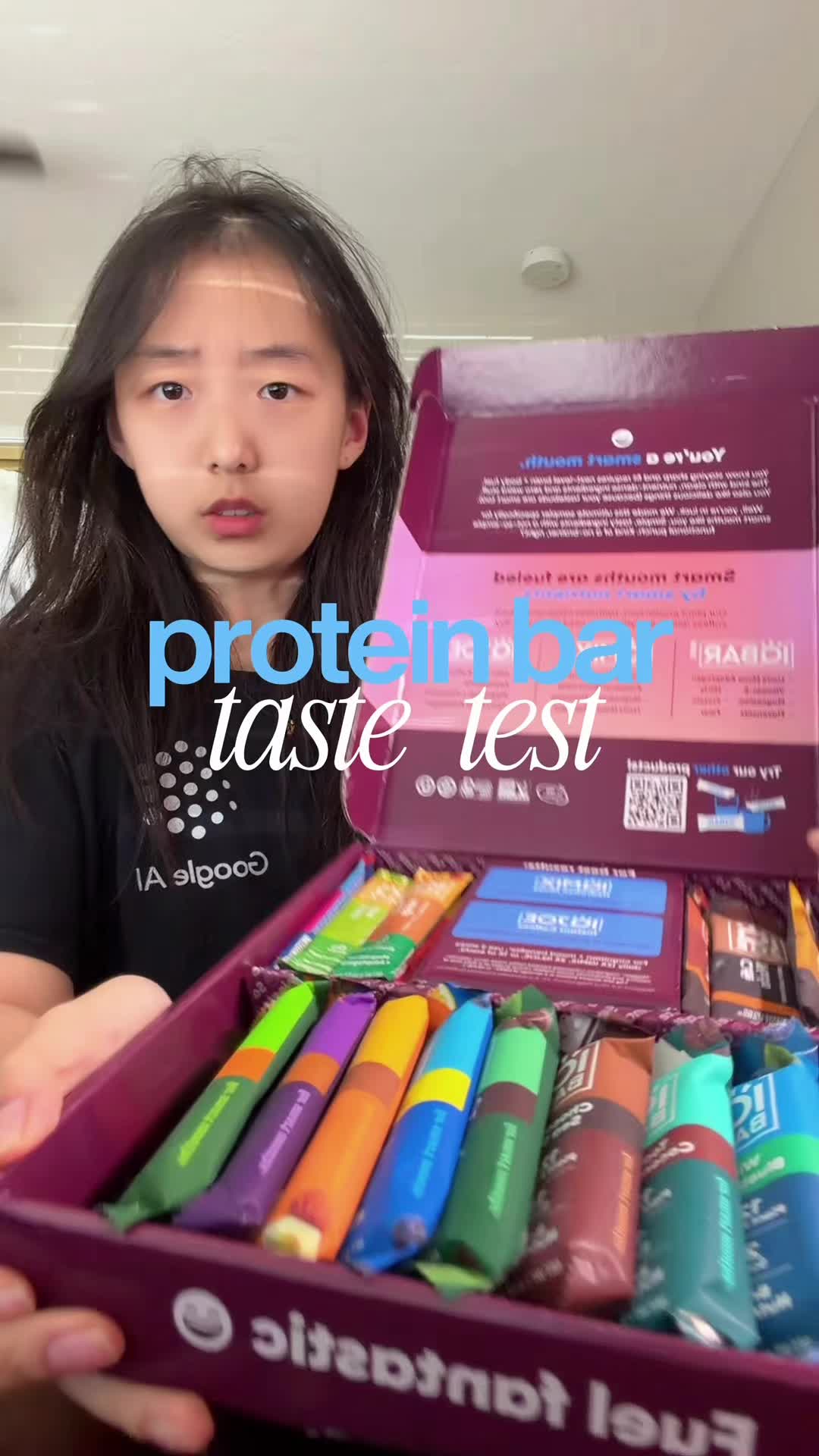 TikTok post by @xxiaoxyz for IQBAR. Caption reads: ANOTHER PROTEIN BAR TASTE TESTTT @SHOP IQBAR lemon....