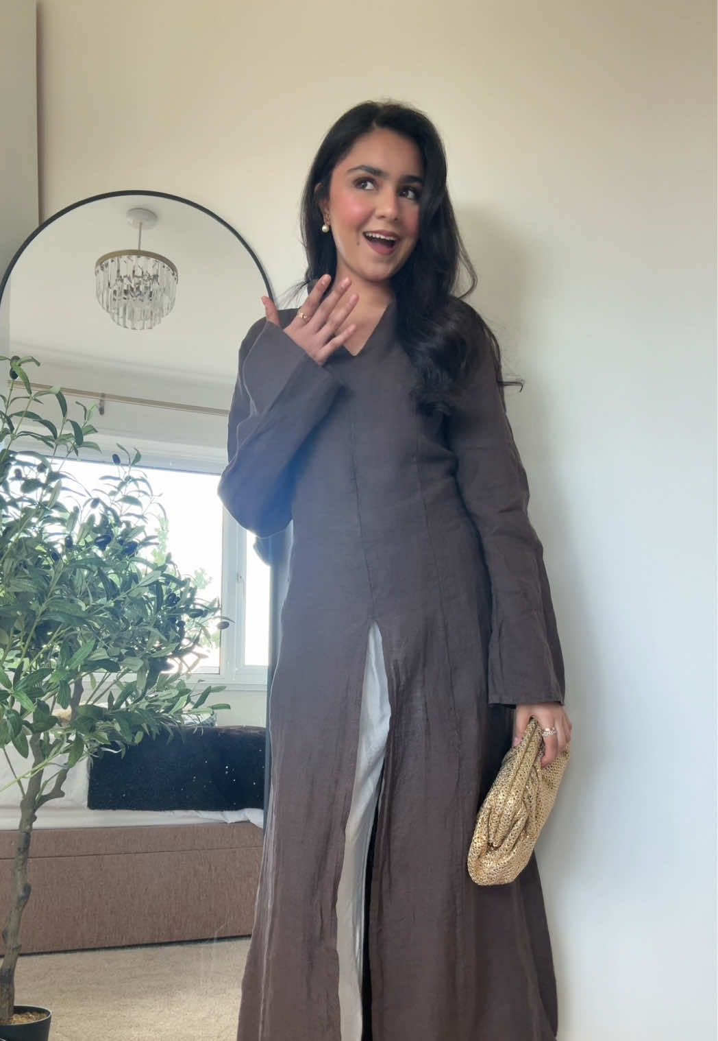 TikTok post by @iitszainabb for emlavish. Caption reads: [...] #fyp #modestfashion #modestdresses #emlavish....