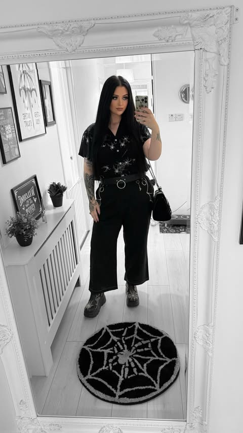 Instagram post by @beautevil.corpse for Hell Bunny. Caption reads: [...] fit today 🕷️ • • Trousers* & Shirt*....