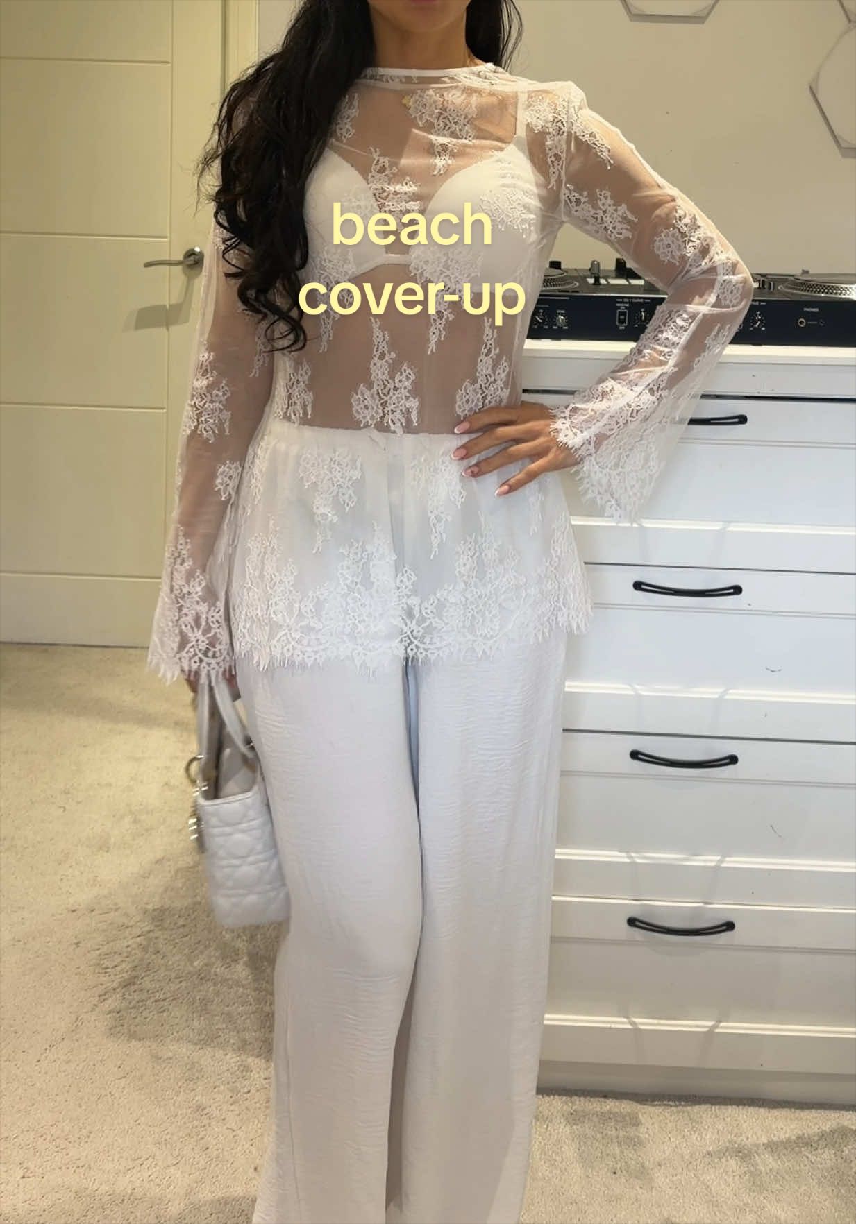 TikTok post by @tyrabaylis for emlavish. Caption reads: Wow the lace top for your next trip!🤍👙@emlavish....