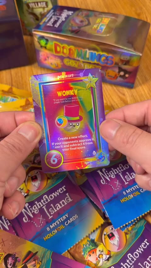 Instagram post by @tiktokboardgames for Doomlings. Caption reads: Doomlings has a new bolster Expansion and Goldbox....