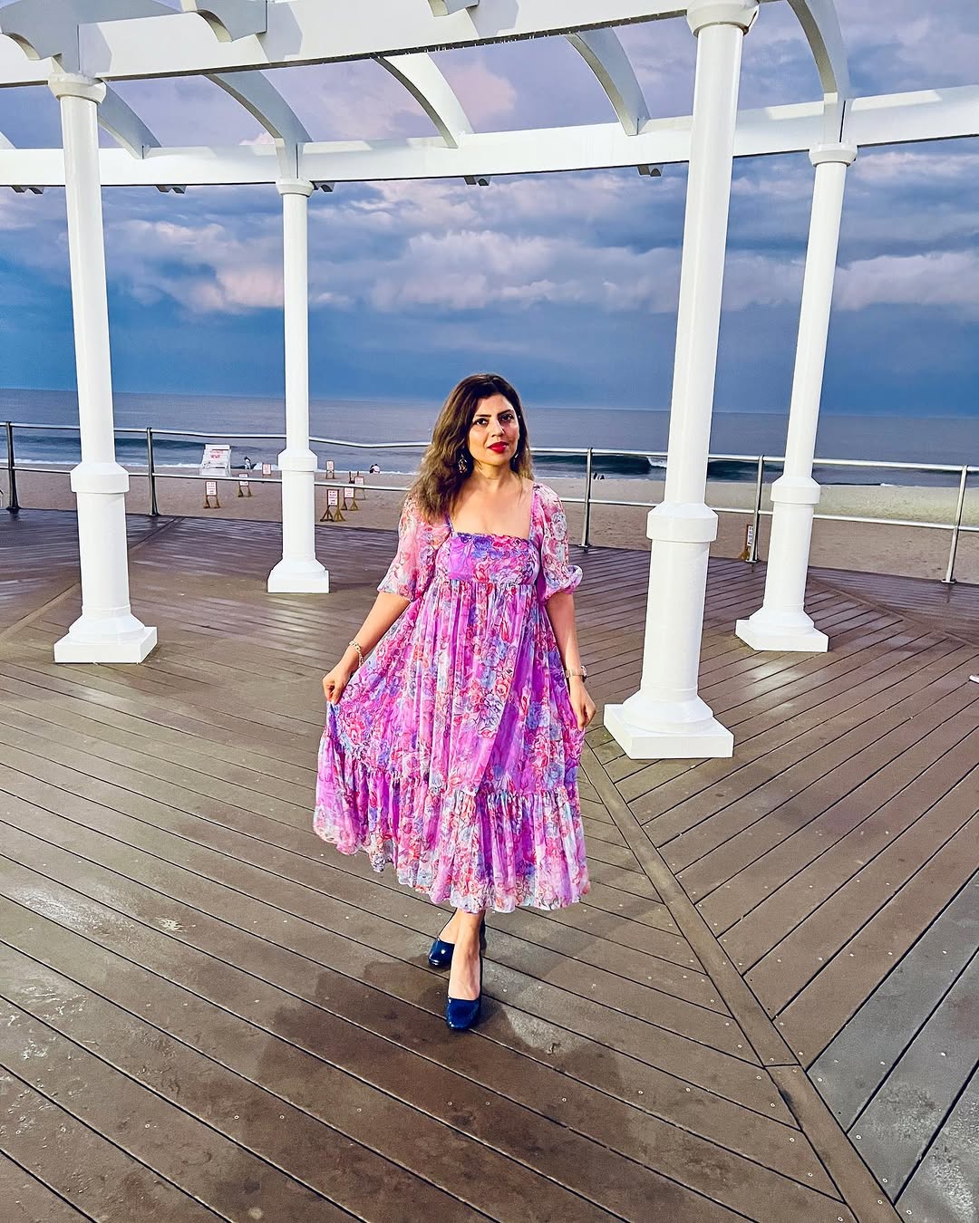 Instagram post by @adiglamlife for shoppinkblush.com. Caption reads: Finding joy in the purple moments....