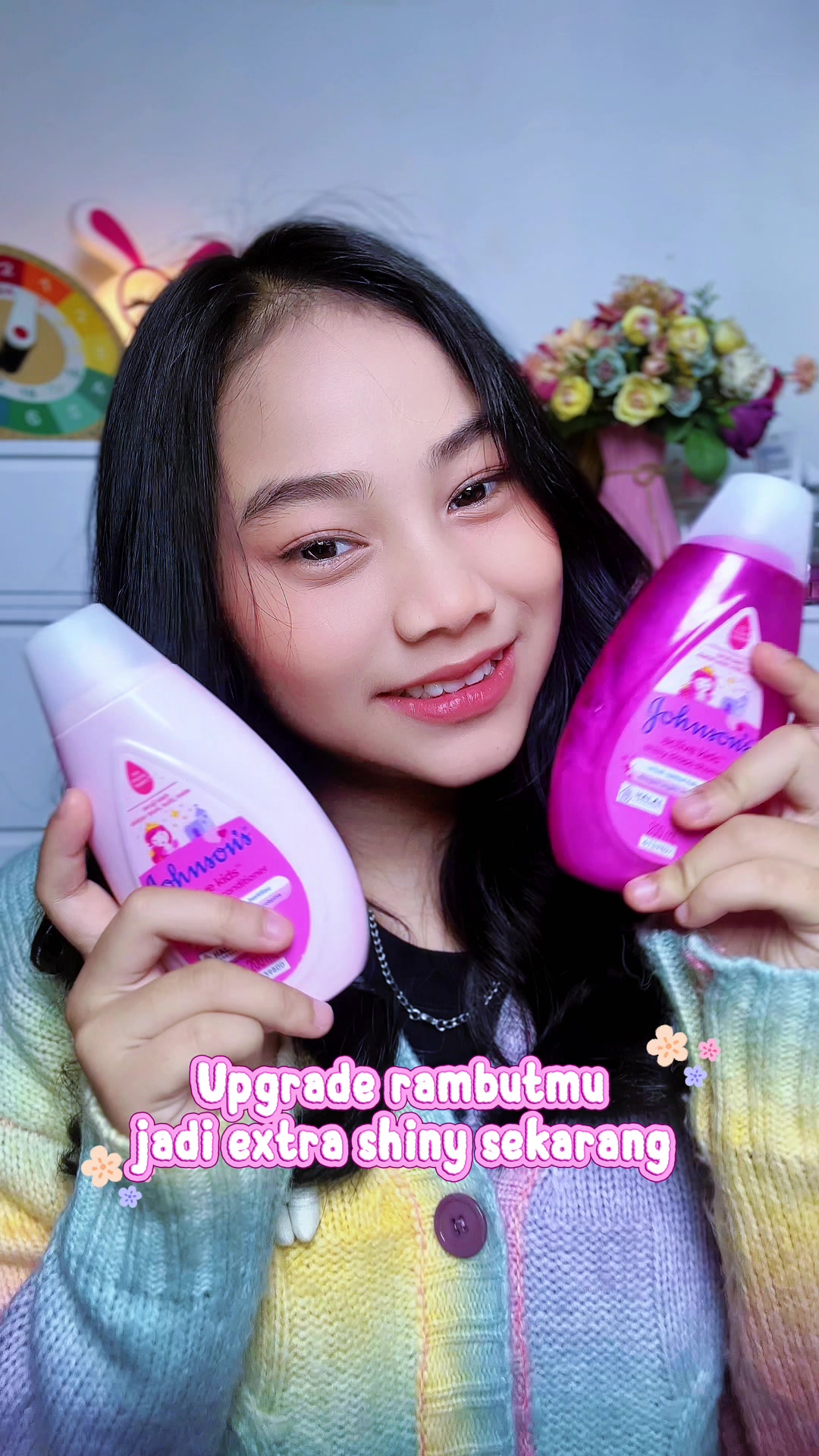 TikTok post by @nona_nimut for Johnson’s Baby Indonesia. Caption reads: Upgrade rambutmu jadi extra shiny sekarang! pakai....