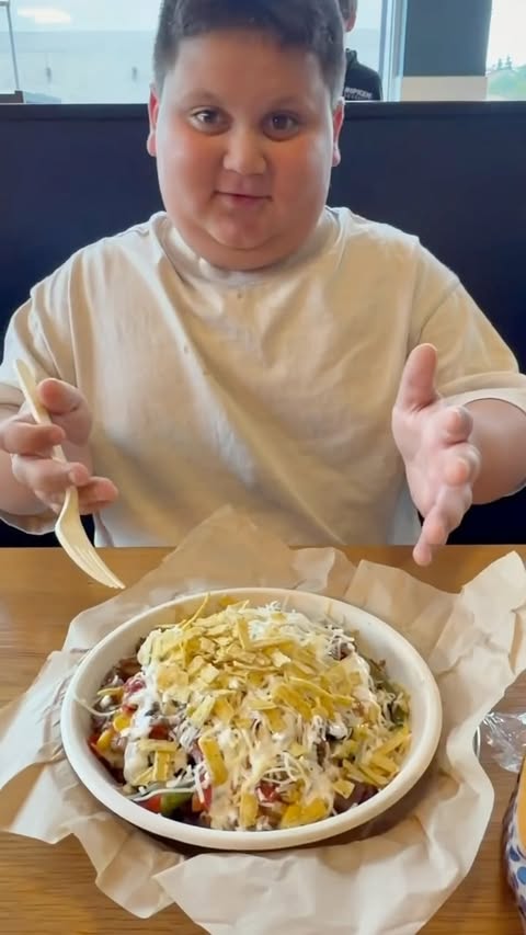 Instagram post by @itztherealrizzler for QDOBA. Caption reads: #QDOBAPartner QDOBA is Rizz Approved!! Text [...].