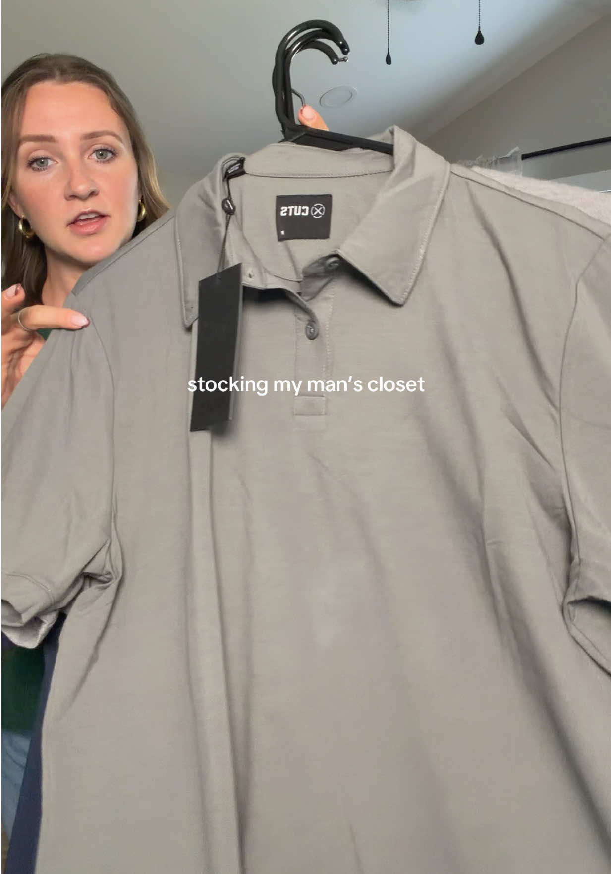 TikTok post by @the.mrs.angela for Cuts Clothing. Caption reads: @Cuts Clothing #mensfashion #mensshirt #poloshirt....