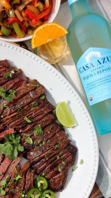 Instagram post by @kristenfaith_eats for Casa Azul Spirits. Caption reads: #ad21 Marinated Skirt Steak and Fajita veggies....