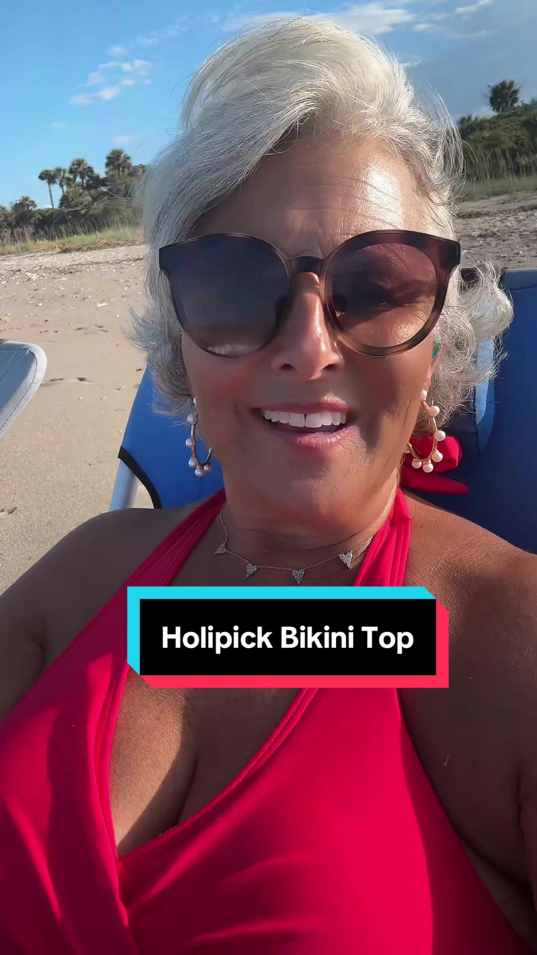 TikTok post by @the.lynnadcox for Holipick Swimsuits. Caption reads: @Holipick Swimsuits love this stylish bikini top!....