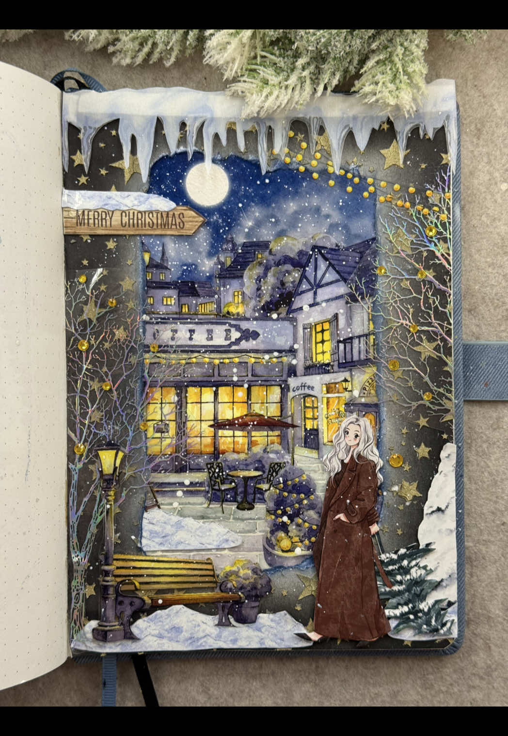 TikTok post by @tori_journal for The Washi Tape Shop. Caption reads: ASMR journal Christmas scenery🌙❄️🎄🕯️💫🌌🧣....