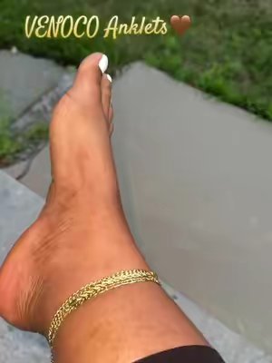 TikTok post by @latekaevans for VENOCO. Caption reads: Inlove with these gold anklets from @VENOCO....