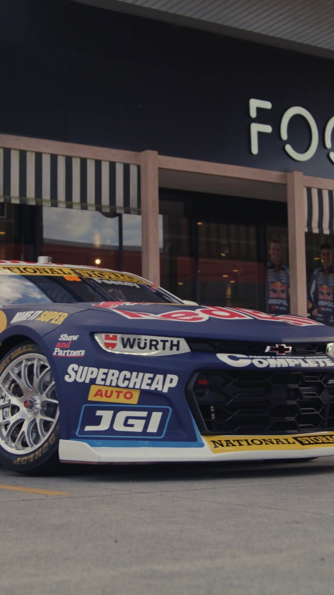 Instagram post by @redbullampolracing for Red Bull. Caption reads: [...] hands on the limited-edition Red Bull Ampol....