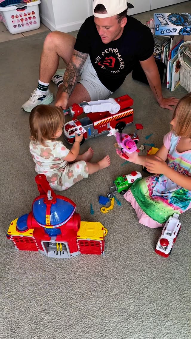 Instagram post by @marissandreaa for PAW Patrol. Caption reads: The girls are LOVING their new @pawpatrol fire....