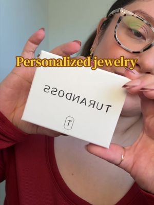 TikTok post by @karen21_21 for Turandoss Jewelry. Caption reads: ✨ birthstone + birth flower = obsessed✨🤎....