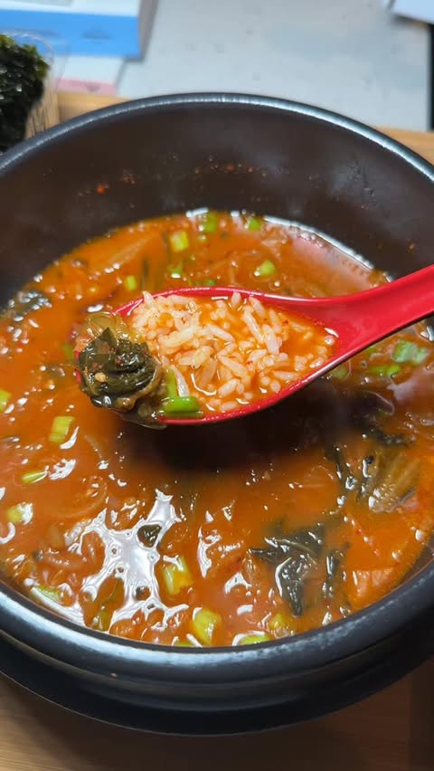 Instagram post by @exquicyd.taste for Kikkoman USA. Caption reads: KIMCHI JJIGAE OR KIMCHI STEW might just make a few....