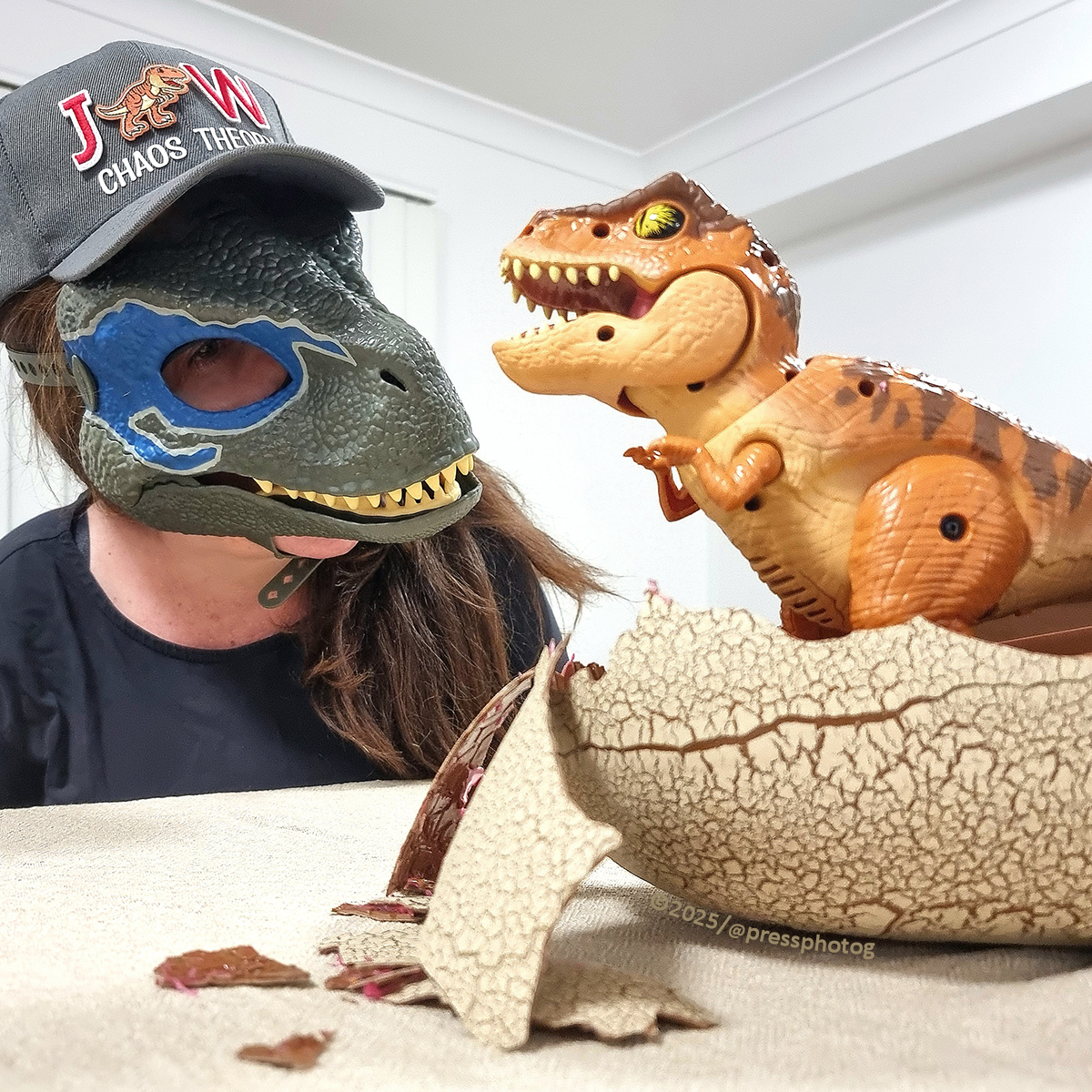 Instagram post by @pressphotog for Spin Master. Caption reads: '𝗝𝗨𝗥𝗔𝗦𝗦𝗜𝗖 𝗪𝗢𝗥𝗟𝗗: 𝗖𝗛𝗔𝗢𝗦....