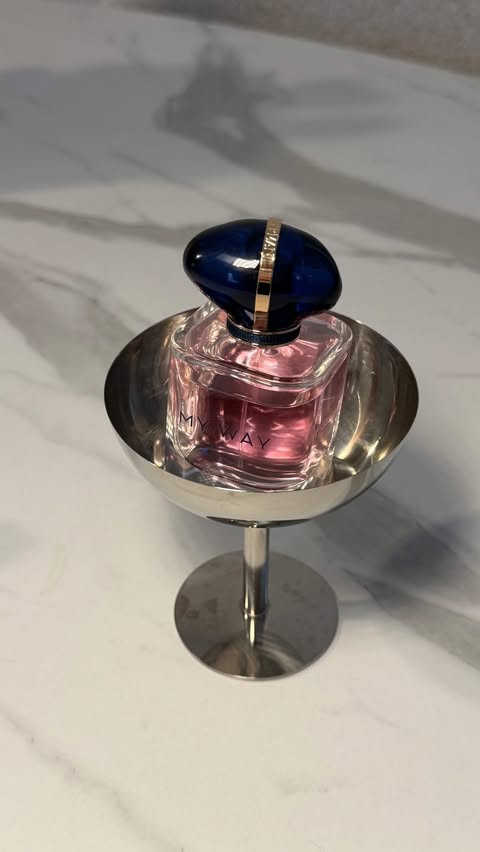 Instagram post by @camillacolombo for Armani beauty. Caption reads: [...] chic to refill “my way” perfume by....