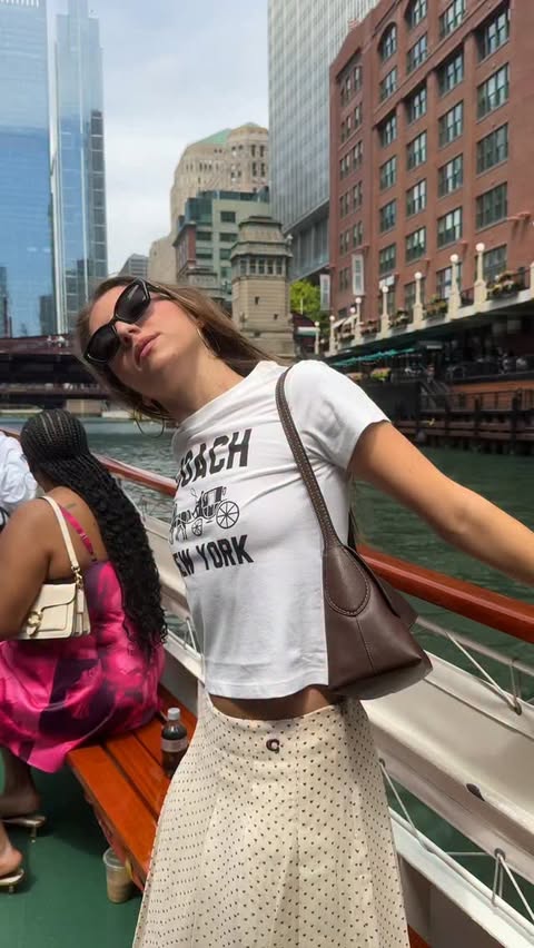 Instagram post by @zoifish for Coach. Caption reads: I LOVE CHICAGO I LOVE CHICAGO♥️♥️♥️♥️♥️ @coach....