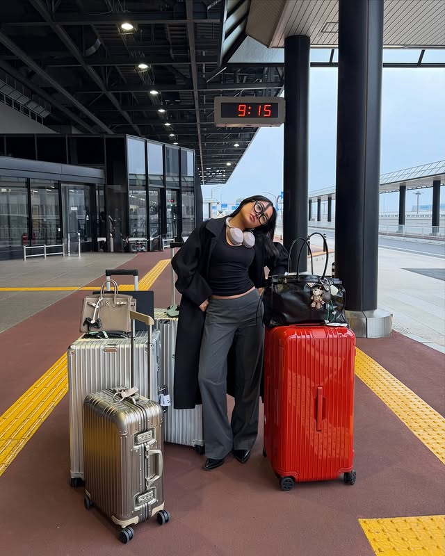 Instagram post by @ryvlsco for RIMOWA. Caption reads: Always with my @rimowa ★ Added a pop of color with....