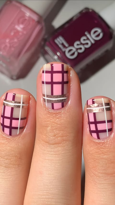 Instagram post by @abe.nailbabe for essie. Caption reads: Is plaid in style?🤔💕yay or nay😅 #essiepartner....