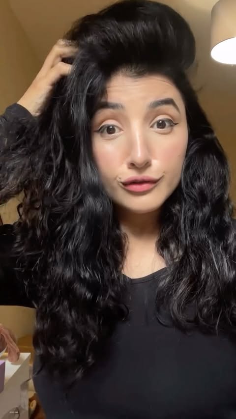 Instagram post by @amina.jamil.malik for Aussie Haircare. Caption reads: #ad Embrace your natural hair. #aussiehair....
