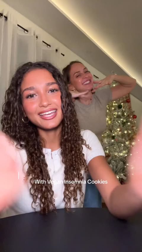 Instagram post by @amoifairburn for Insomnia Cookies. Caption reads: [...] catch-up with the fam and a box of....