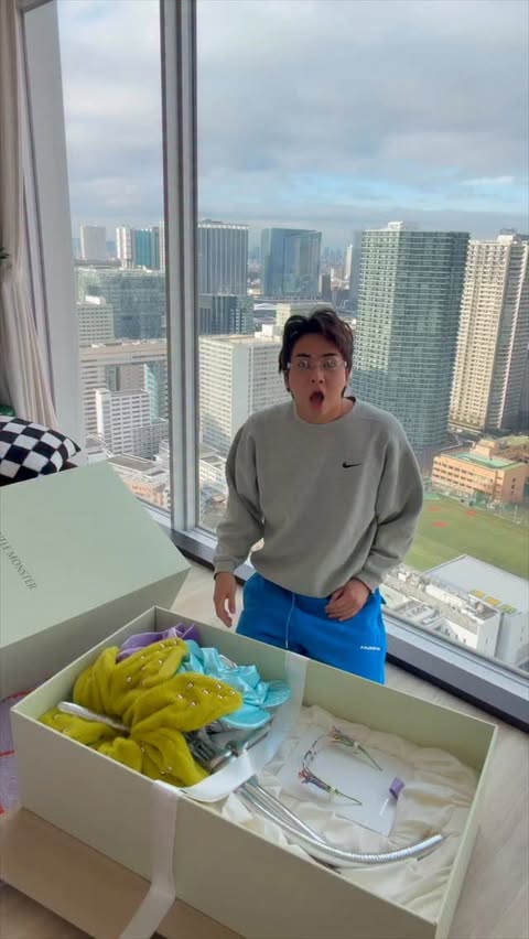 Instagram post by @worldofxtra for GENTLE MONSTER. Caption reads: Unboxing and trying on the @gentlemonster bouquet....