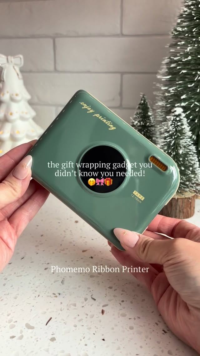 Instagram post by @hall_at_home for Phomemo. Caption reads: Level up your gift wrapping game…

…with the....