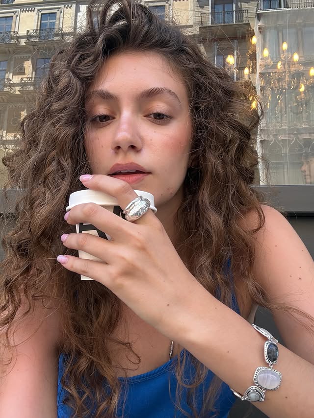 Instagram post by @sofshevtsova for En Route Jewelry. Caption reads: wearing @enroutejewelry_ 💍🪼🖇️🐟 AD.